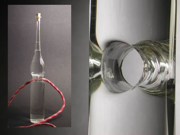 Bouteille avec passage